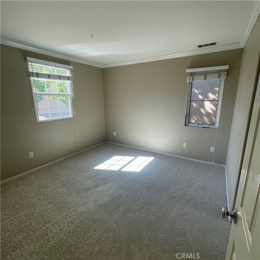 103 Windchime Irvine, CA 92603 - Photo 10 of 16 an empty room with windows