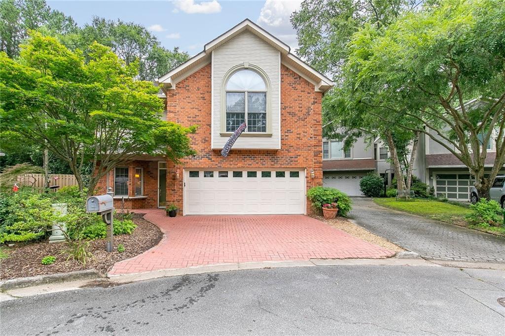 886 Heritage Place Decatur, GA 30033 - Photo 1 of 1 front view of a house with a garden