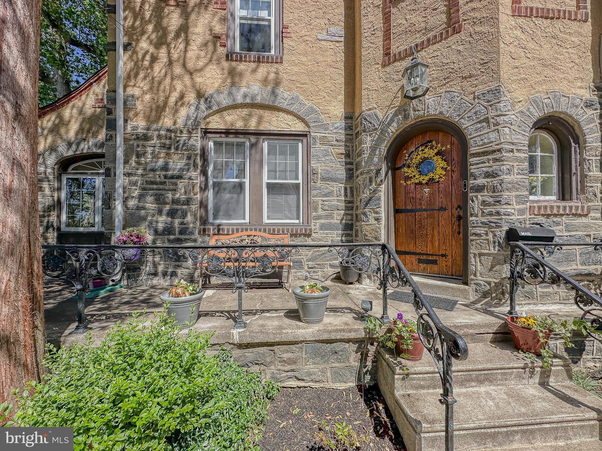 7205 Wayne Avenue Upper Darby, PA 19082 - Photo 5 of 84 a front view of a house with outdoor seating