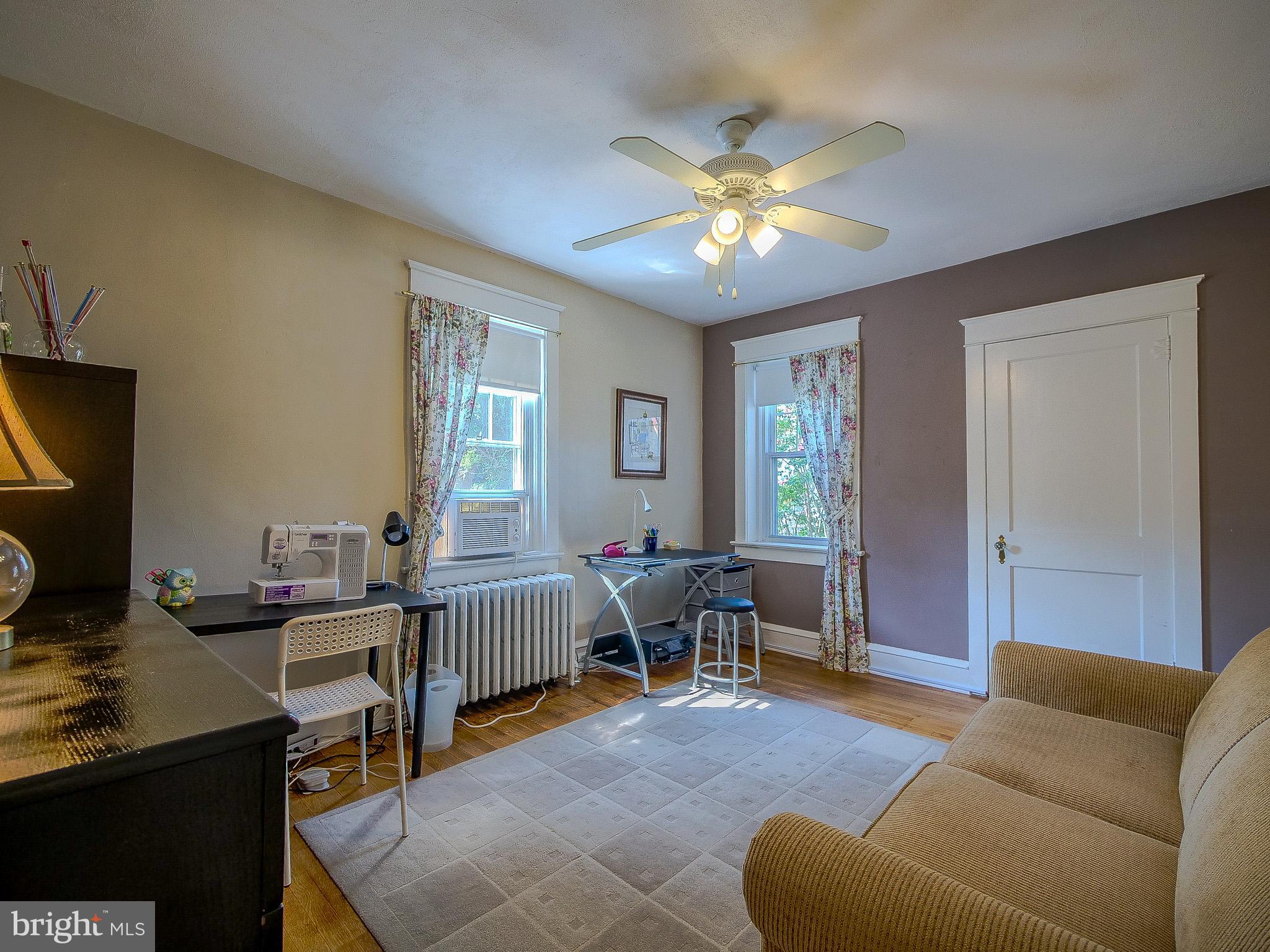 7205 Wayne Avenue Upper Darby, PA 19082 - Photo 52 of 84 a view of a livingroom with workspace and a window