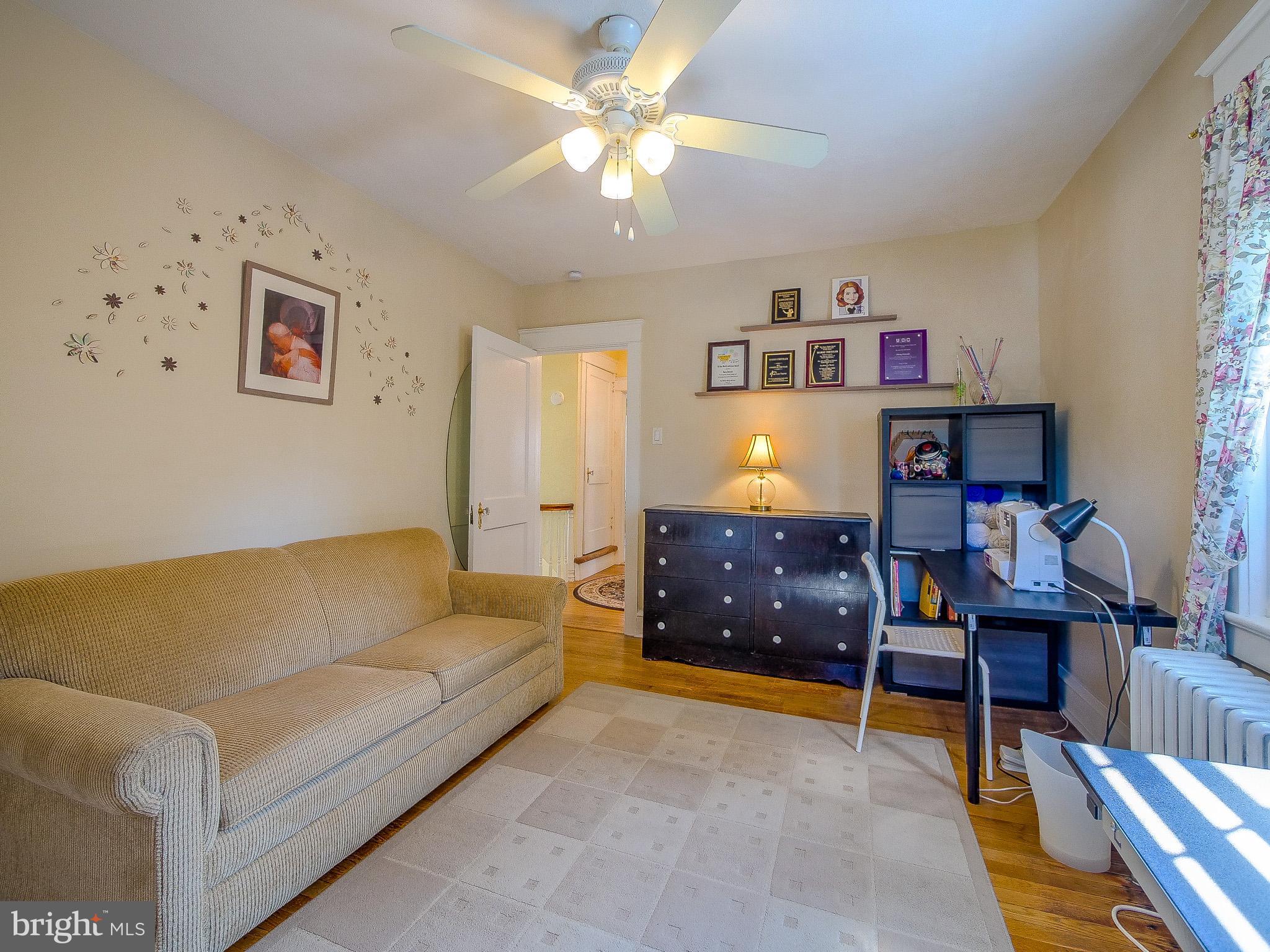 7205 Wayne Avenue Upper Darby, PA 19082 - Photo 54 of 84 a living room with furniture and a window