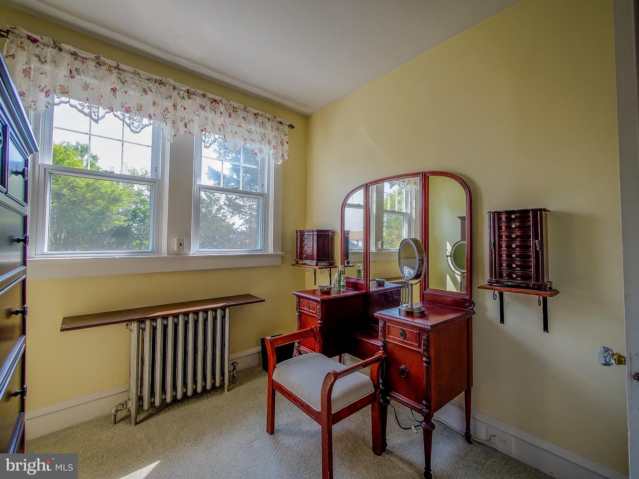 7205 Wayne Avenue Upper Darby, PA 19082 - Photo 64 of 84 a living room with furniture and a large window