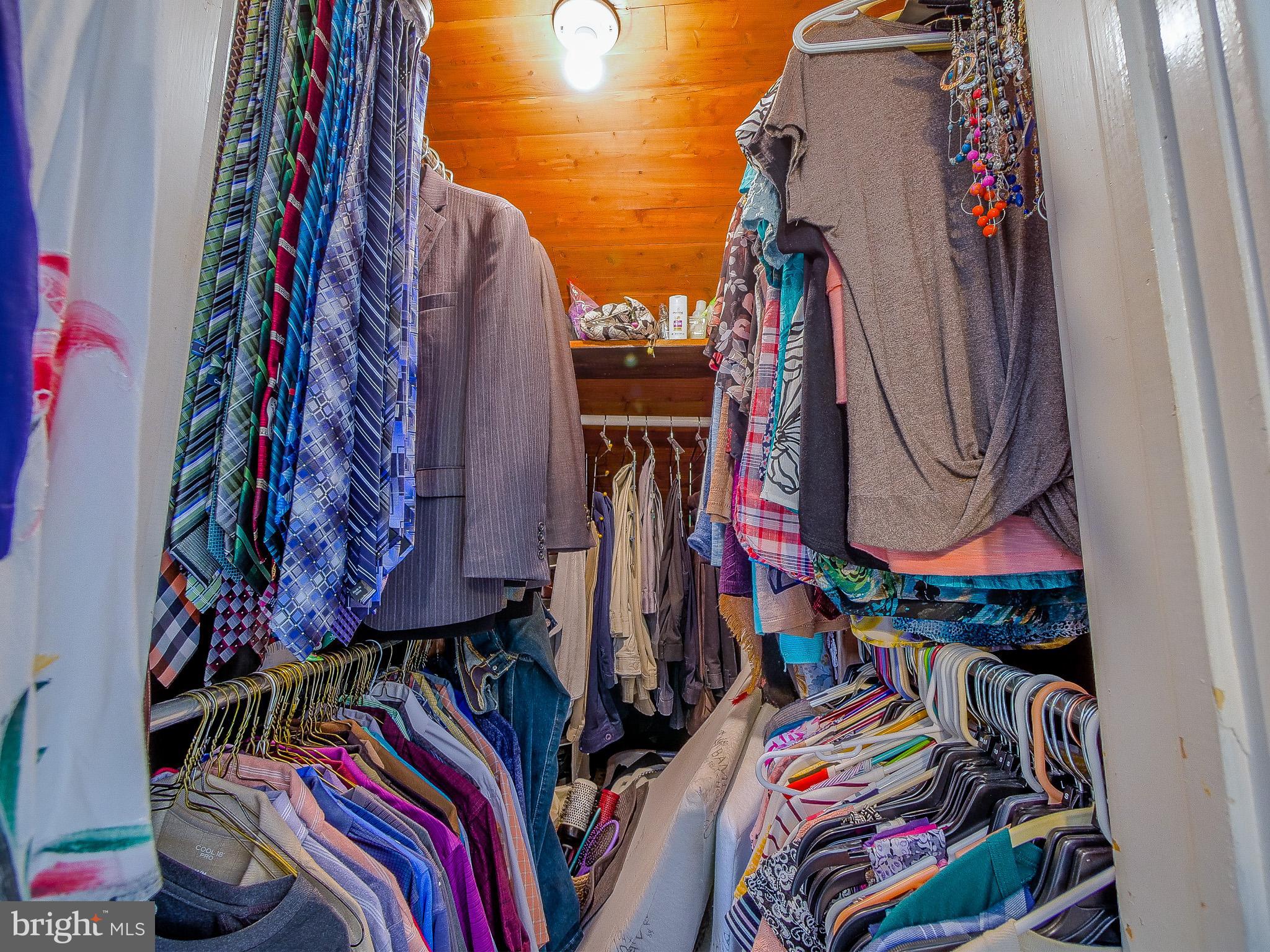 7205 Wayne Avenue Upper Darby, PA 19082 - Photo 65 of 84 a view of walk in closet with clothes and shoes