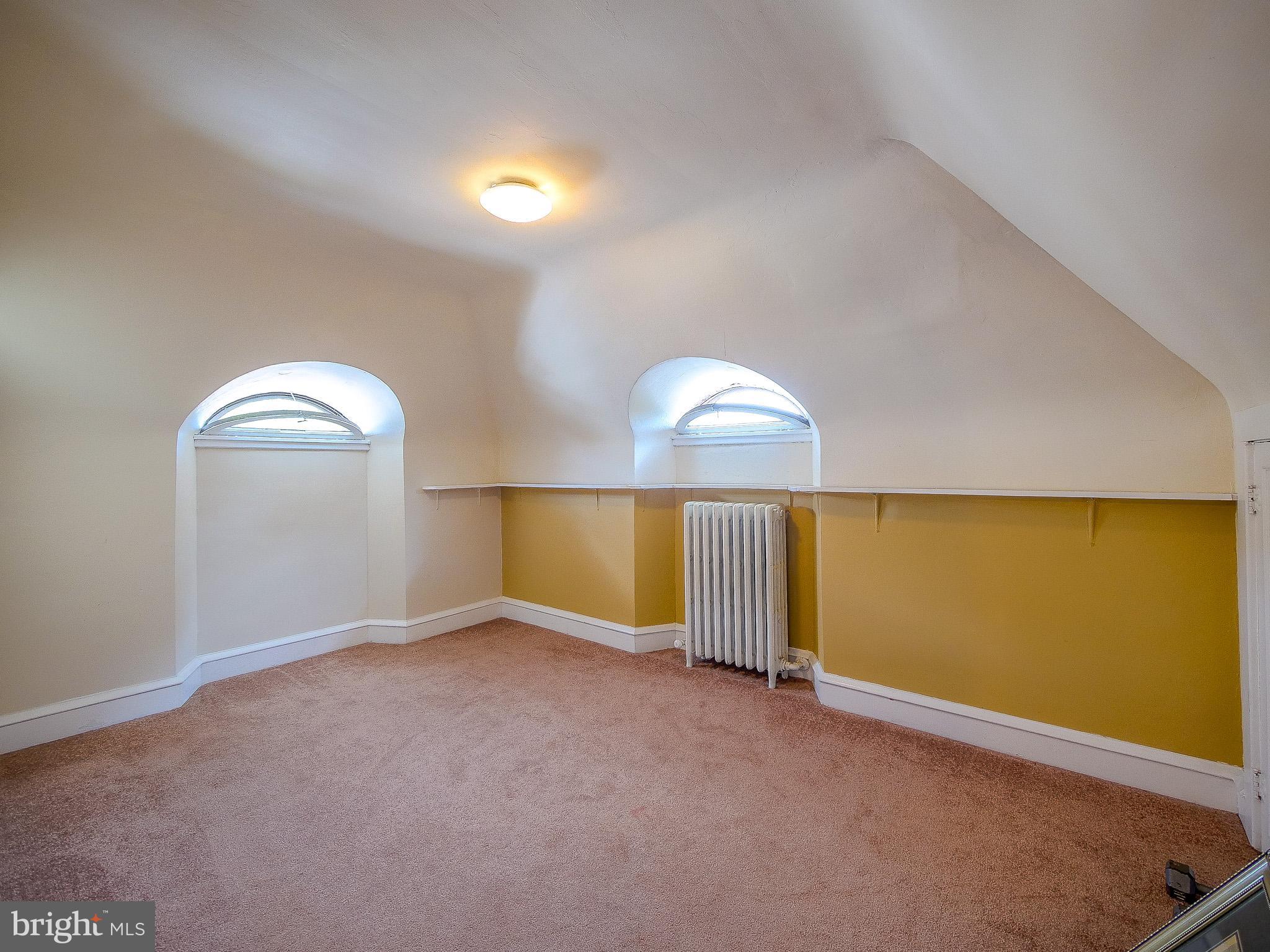 7205 Wayne Avenue Upper Darby, PA 19082 - Photo 72 of 84 an empty room with a empty space and a window