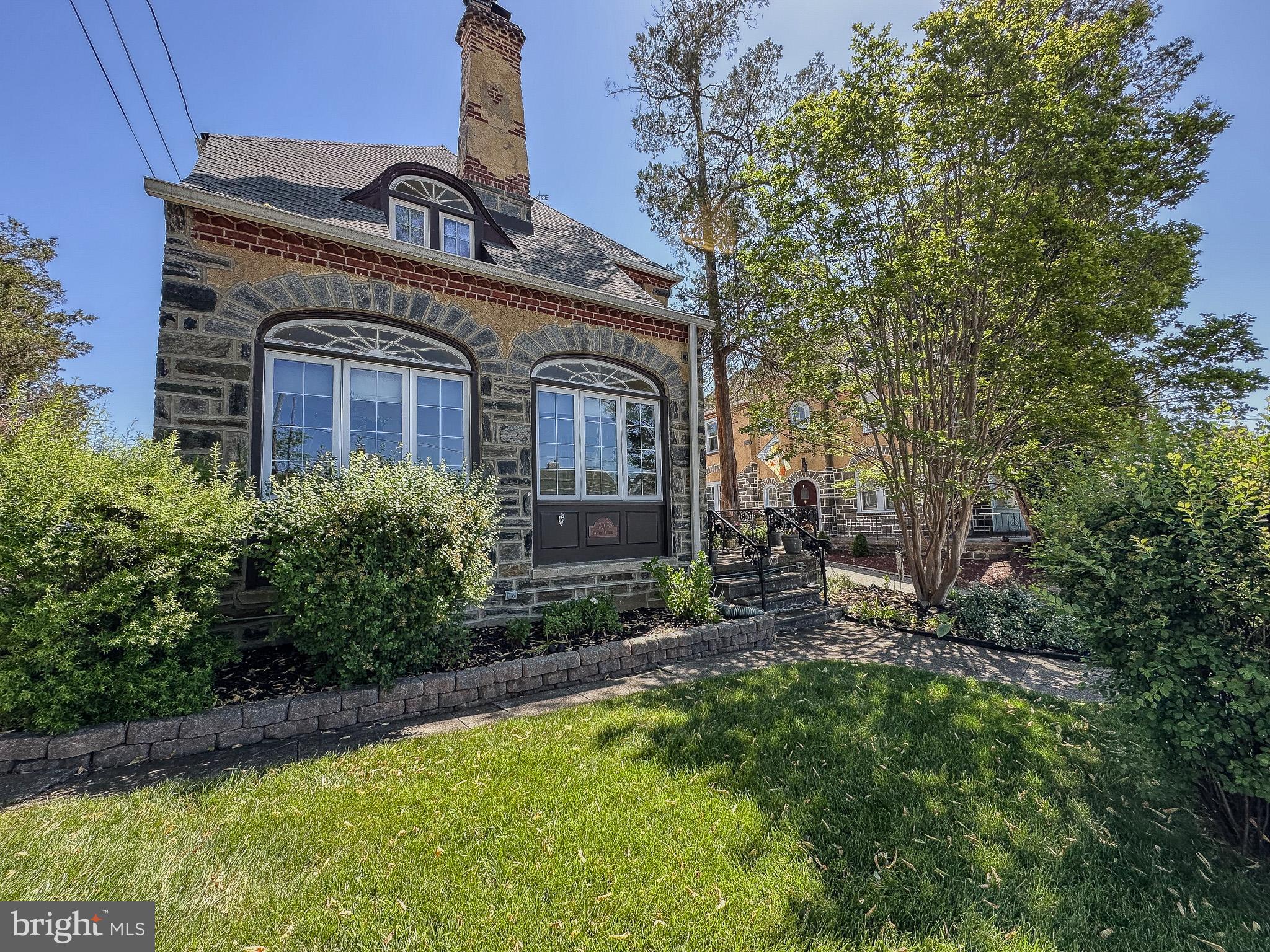 7205 Wayne Avenue Upper Darby, PA 19082 - Photo 8 of 84 a view of a house with a small yard and plants