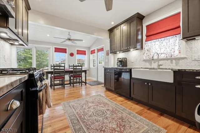 a kitchen with lots of counter top space and appliances