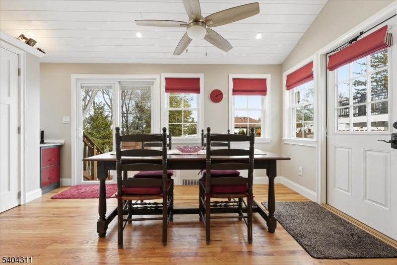 24 Ozone Avenue Cedar Grove, NJ 07009 - Photo 13 of 36 a view of a dining room with furniture window and wooden floor