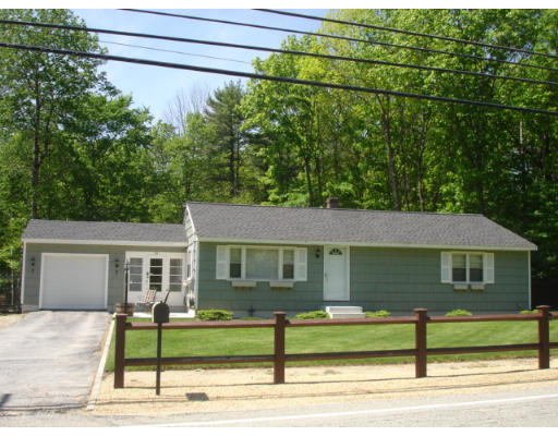 54 Parham Road Tyngsborough, MA 01879 - Photo 1 of 1 a view of a house with a street