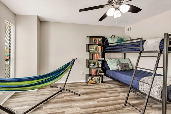 a room with furniture and wooden floor