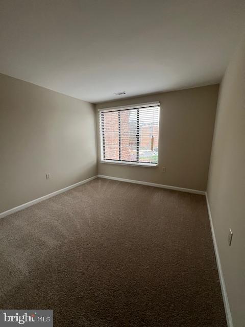18120 Chalet Drive, Unit 11301 Germantown, MD 20874 - Photo 12 of 15 an empty room with a window
