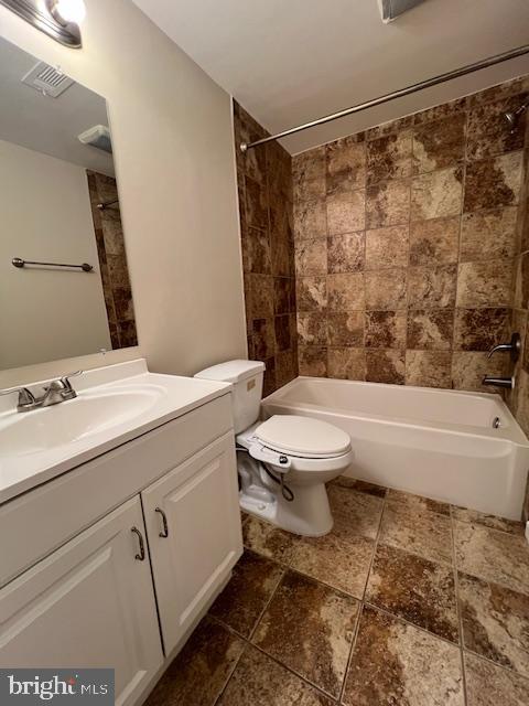 18120 Chalet Drive, Unit 11301 Germantown, MD 20874 - Photo 10 of 15 a bathroom with a sink and a mirror