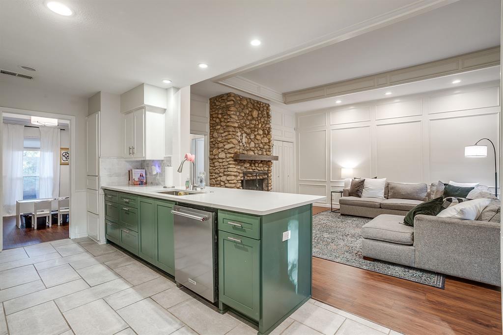 1804 Longbranch Court Arlington, TX 76012 - Photo 13 of 33 a kitchen with a sink and cabinets