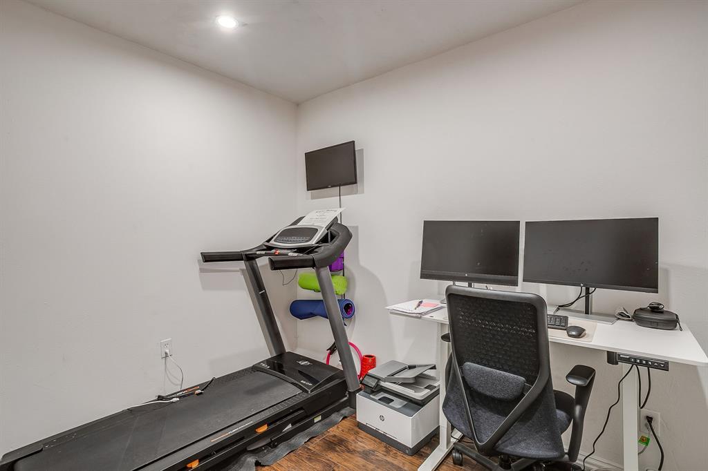 1804 Longbranch Court Arlington, TX 76012 - Photo 28 of 33 a view of workspace with gym equipment