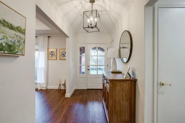 a view of entryway with wooden floor
