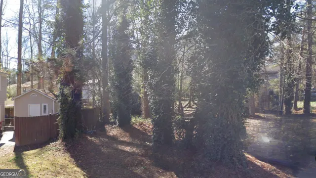 a view of road and trees