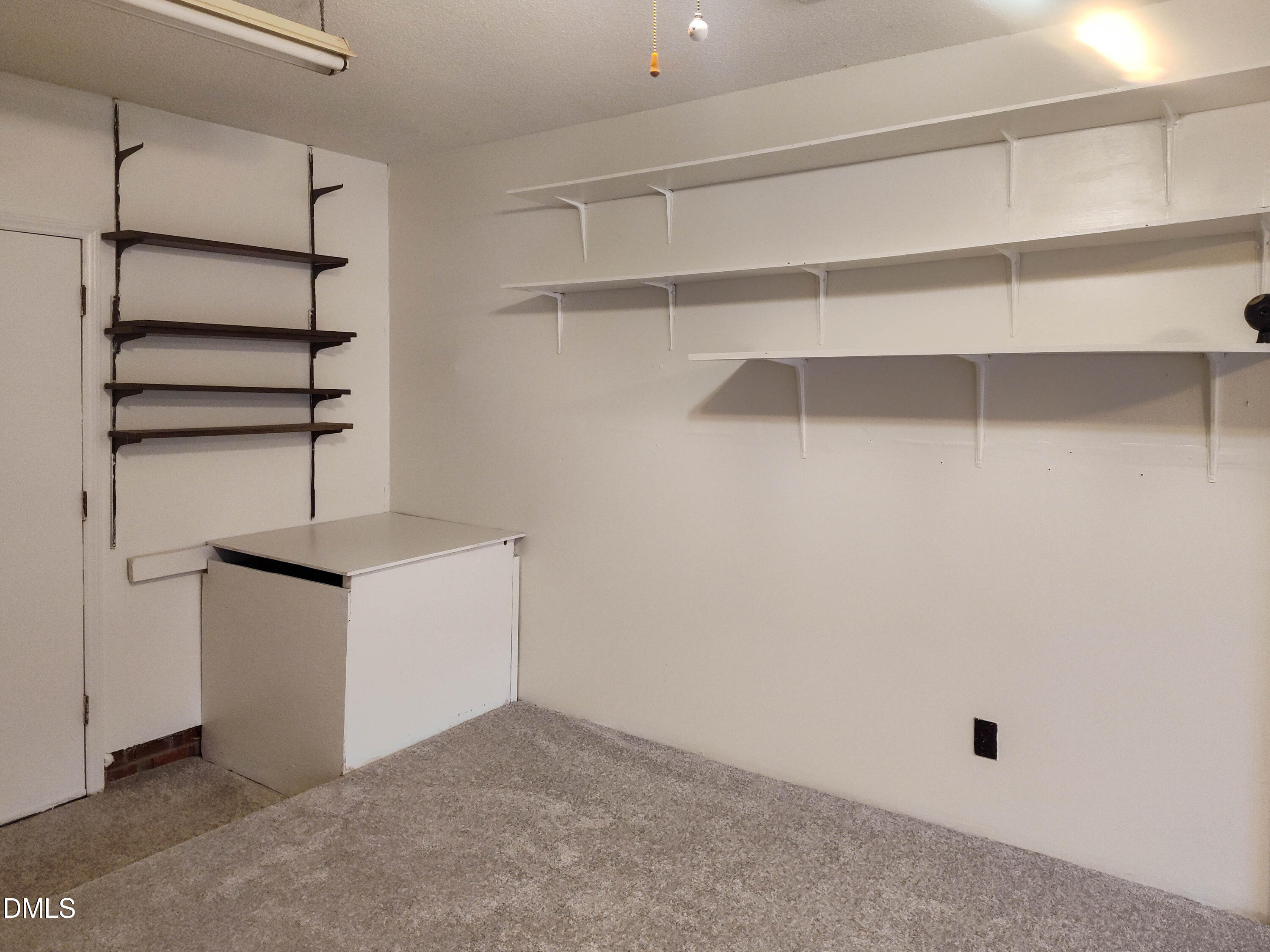 205 Darrel Road La Grange, NC 28551 - Photo 16 of 44 a kitchen with cabinets and a refrigerator