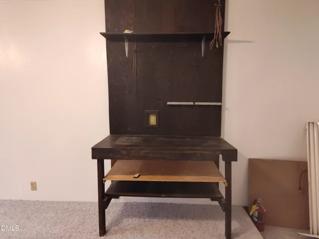 a view of table room with wooden floor