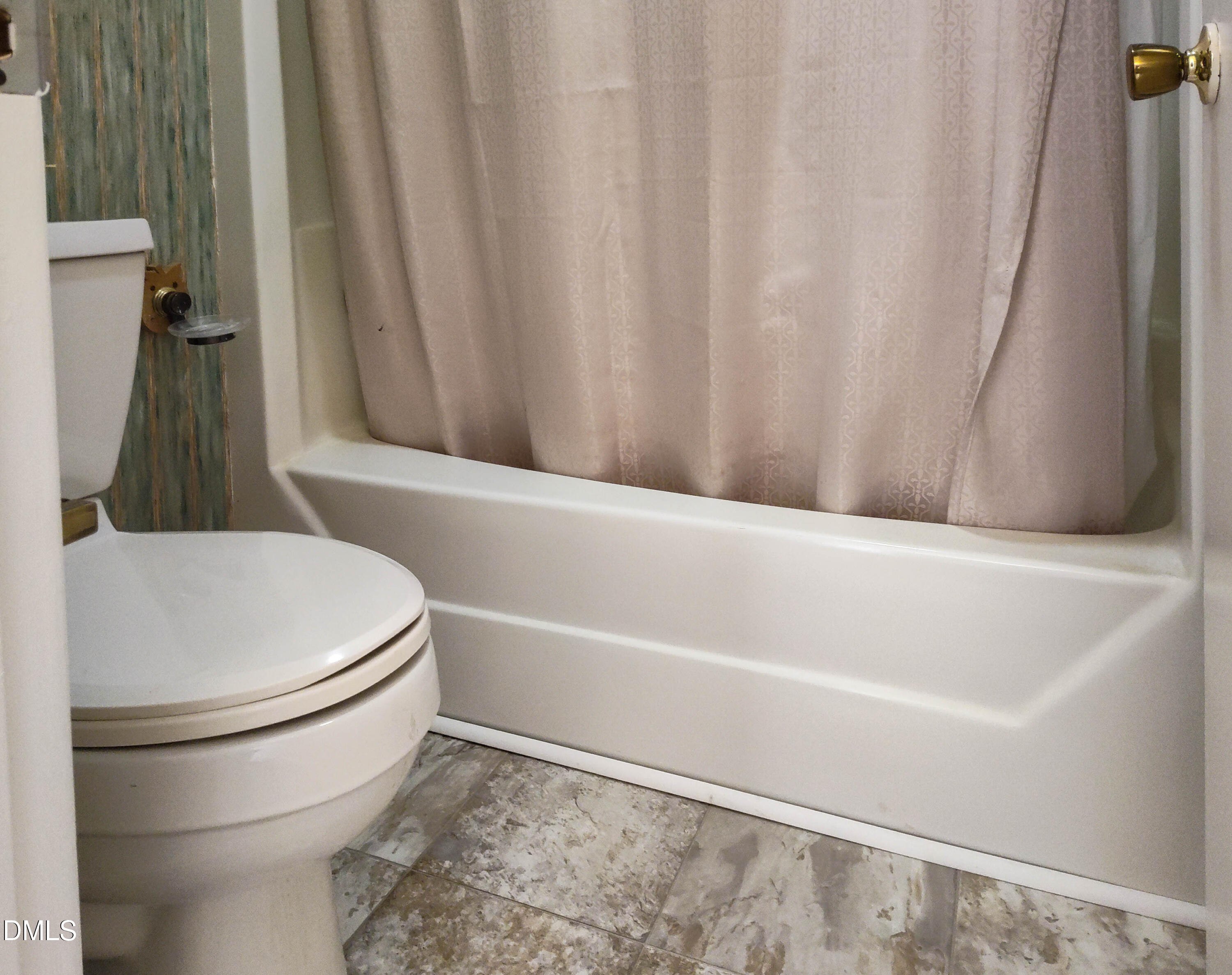 205 Darrel Road La Grange, NC 28551 - Photo 24 of 44 a bathroom with a white toilet and a shower curtain