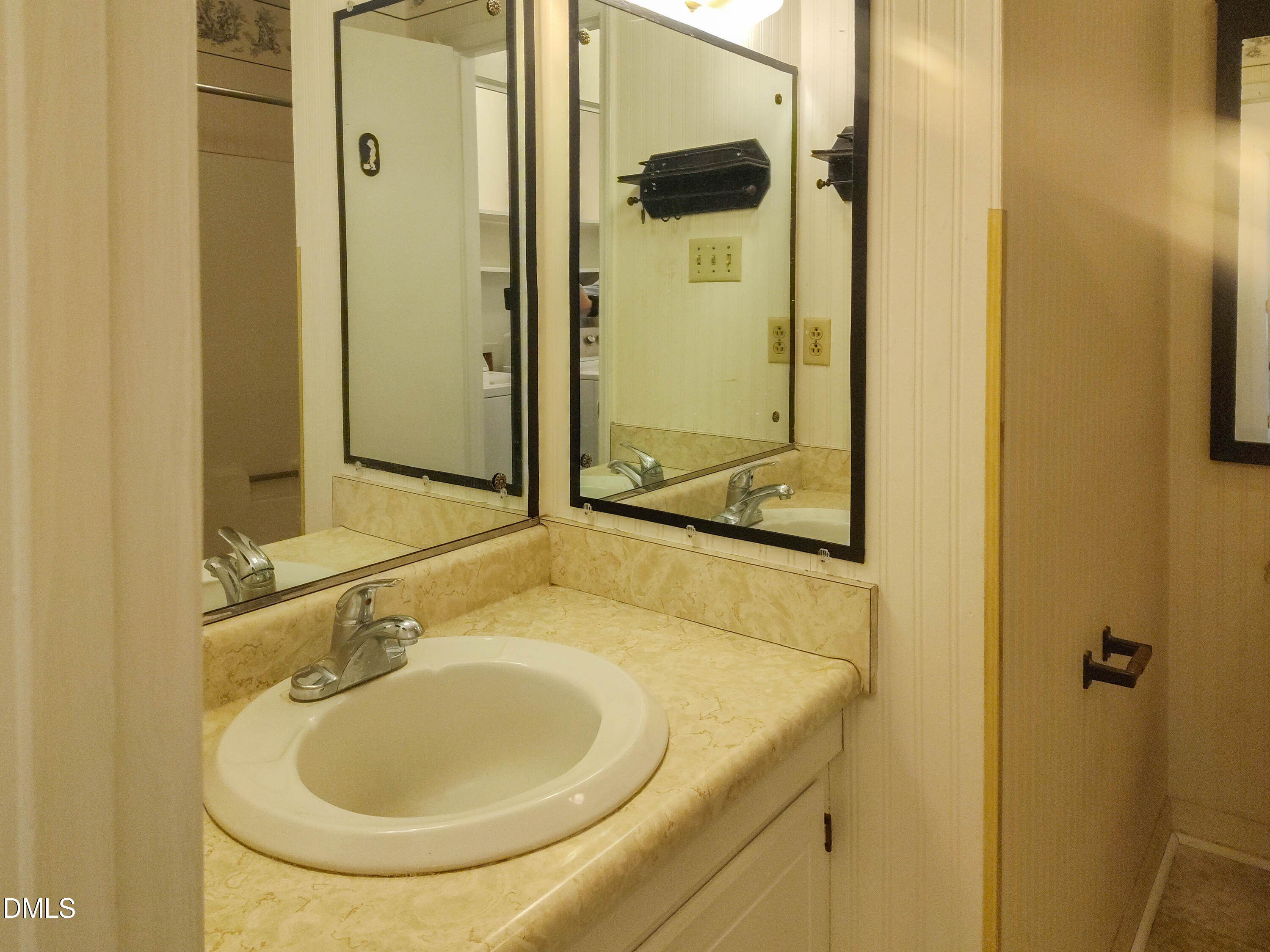 205 Darrel Road La Grange, NC 28551 - Photo 32 of 44 a bathroom with a sink and a mirror