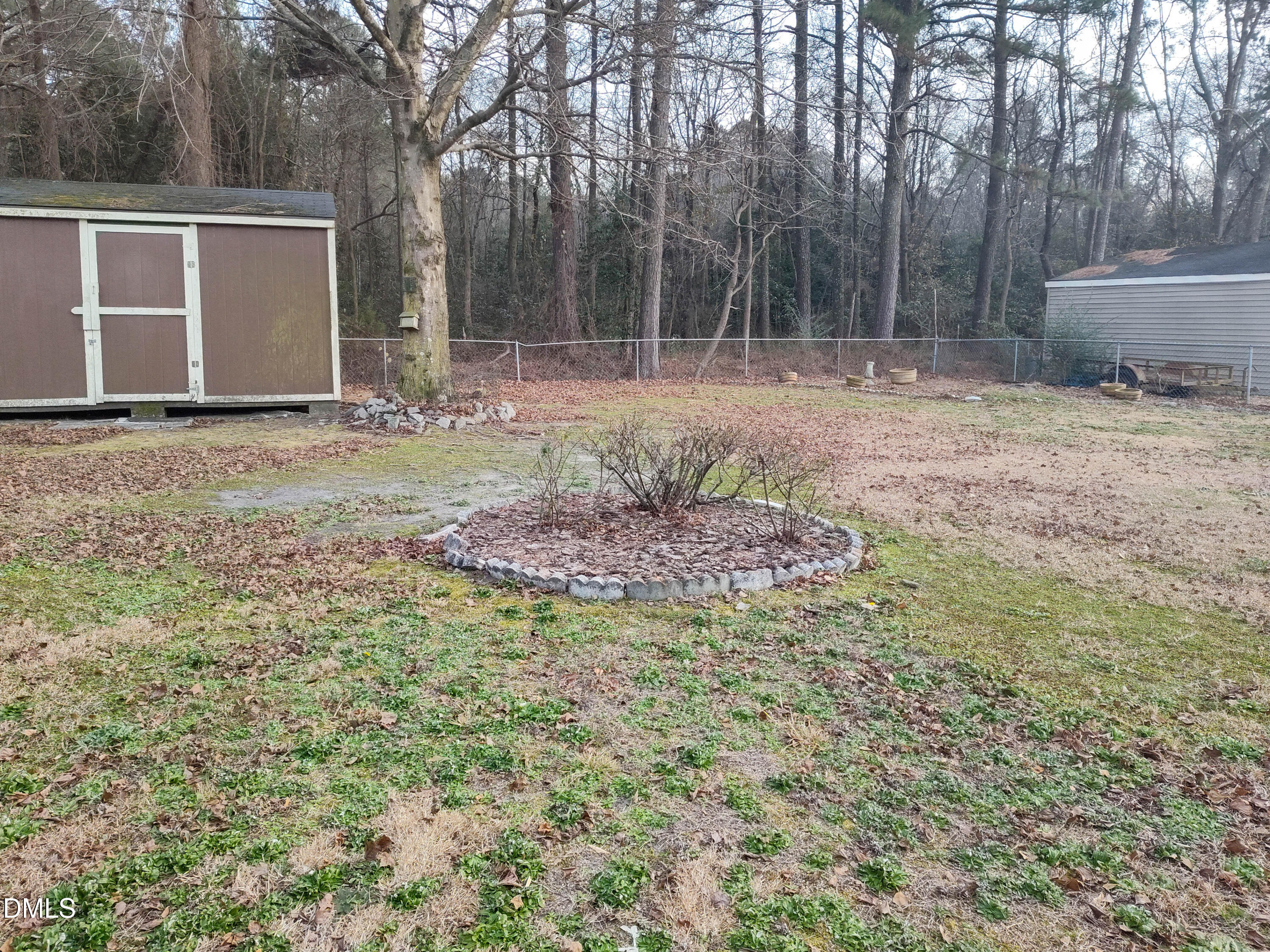 205 Darrel Road La Grange, NC 28551 - Photo 43 of 44 a backyard of a house with lots of green space