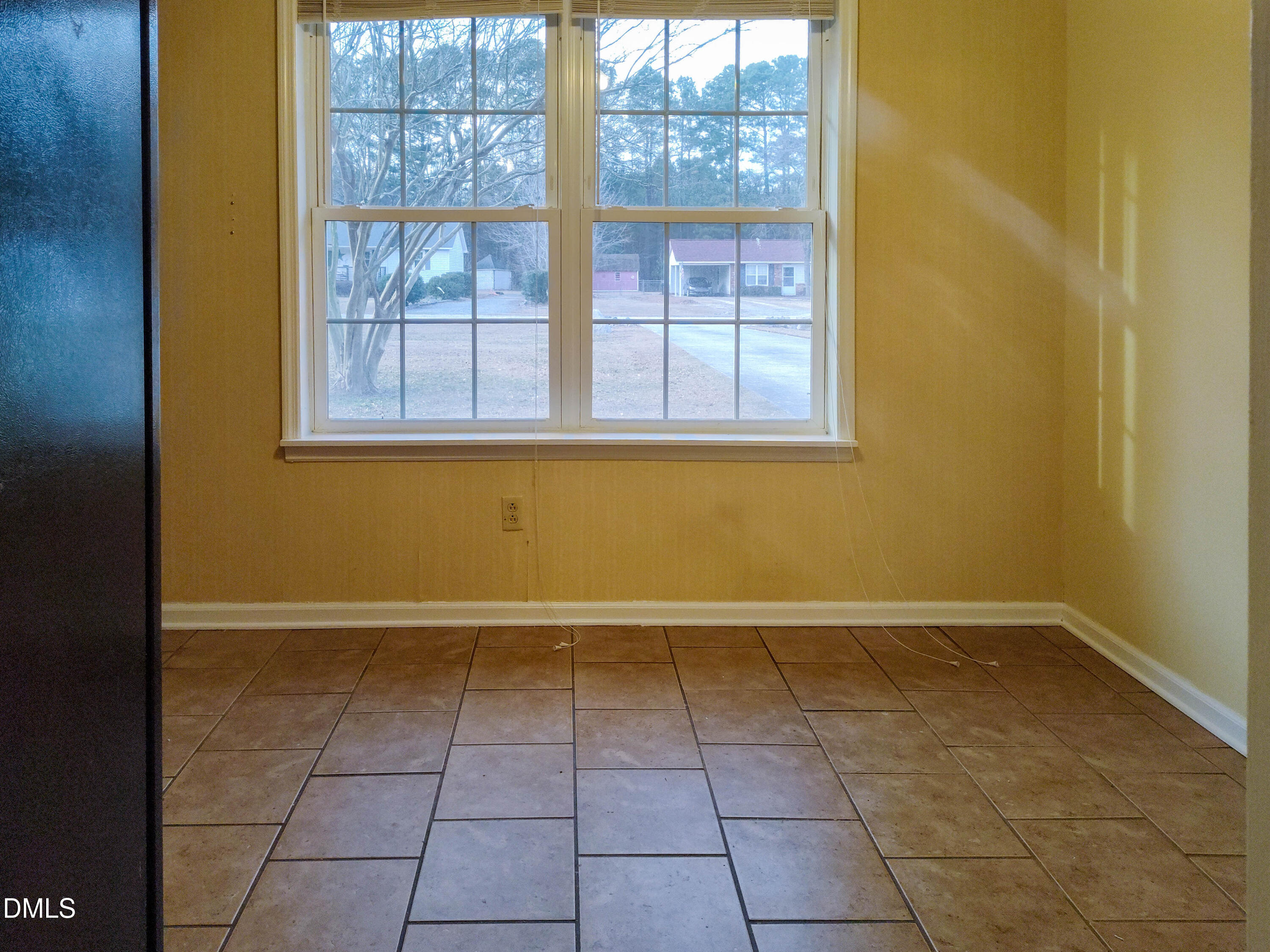 205 Darrel Road La Grange, NC 28551 - Photo 7 of 44 a view of an empty room with a window