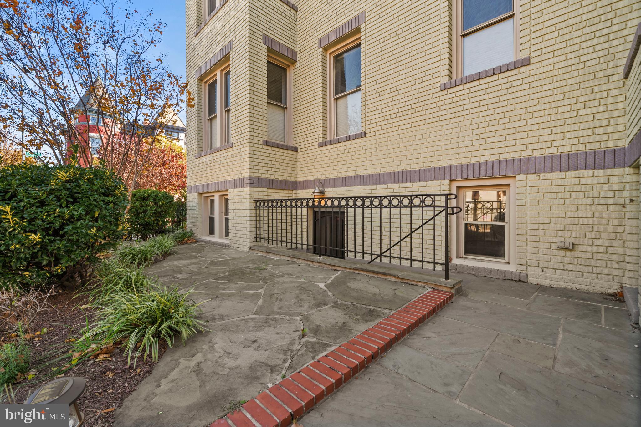 1718 1st Street Northwest, Unit 8 Washington, DC 20001 - Photo 21 of 25 a view of a house with a fence