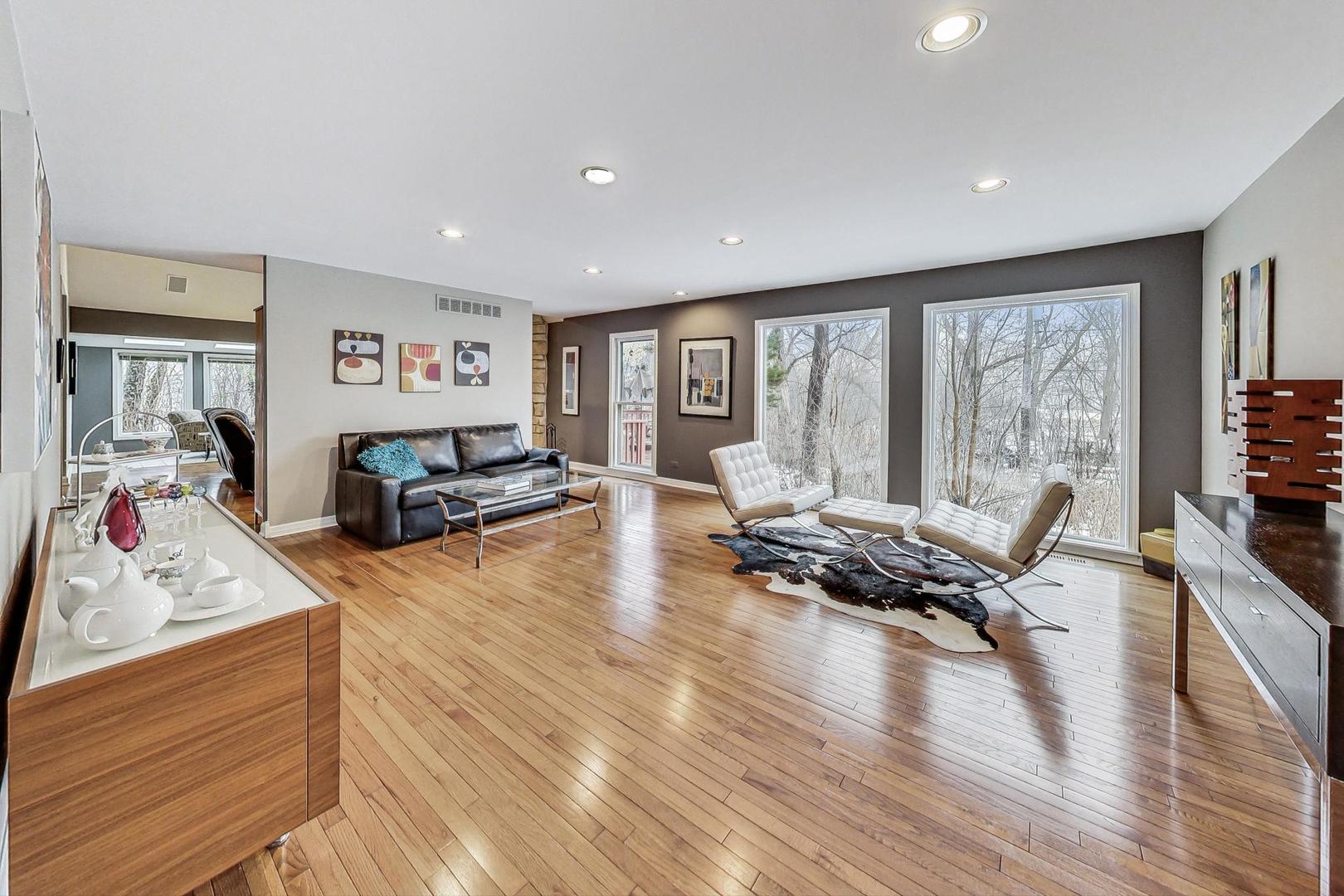 2330 Riverwoods Road Deerfield, IL 60015 - Photo 11 of 50 a living room with furniture large window and wooden floor
