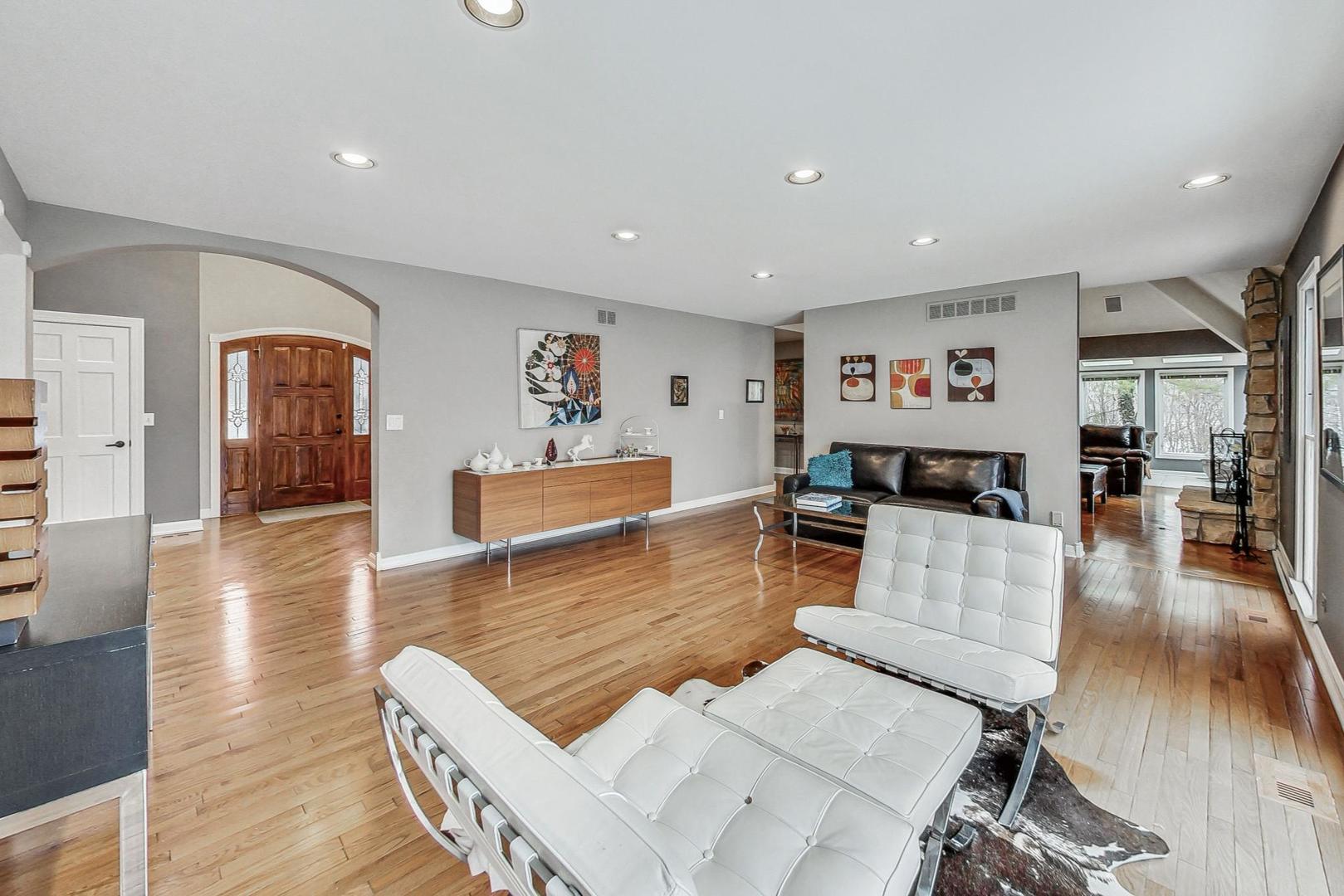 2330 Riverwoods Road Deerfield, IL 60015 - Photo 12 of 50 a living room with furniture and a wooden floor