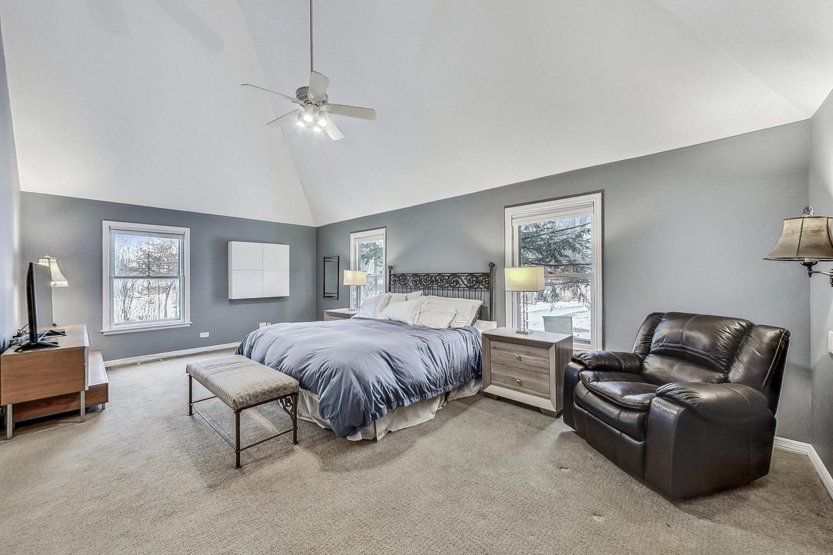 2330 Riverwoods Road Deerfield, IL 60015 - Photo 20 of 50 a bedroom with bed couch and window