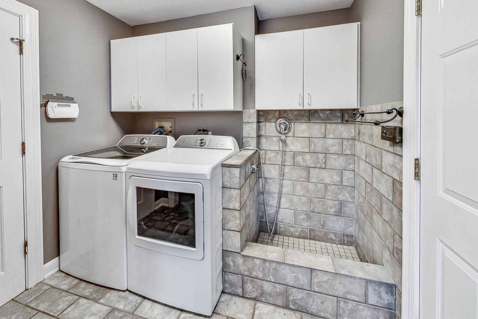2330 Riverwoods Road Deerfield, IL 60015 - Photo 26 of 50 a bathroom with a sink a toilet and shower