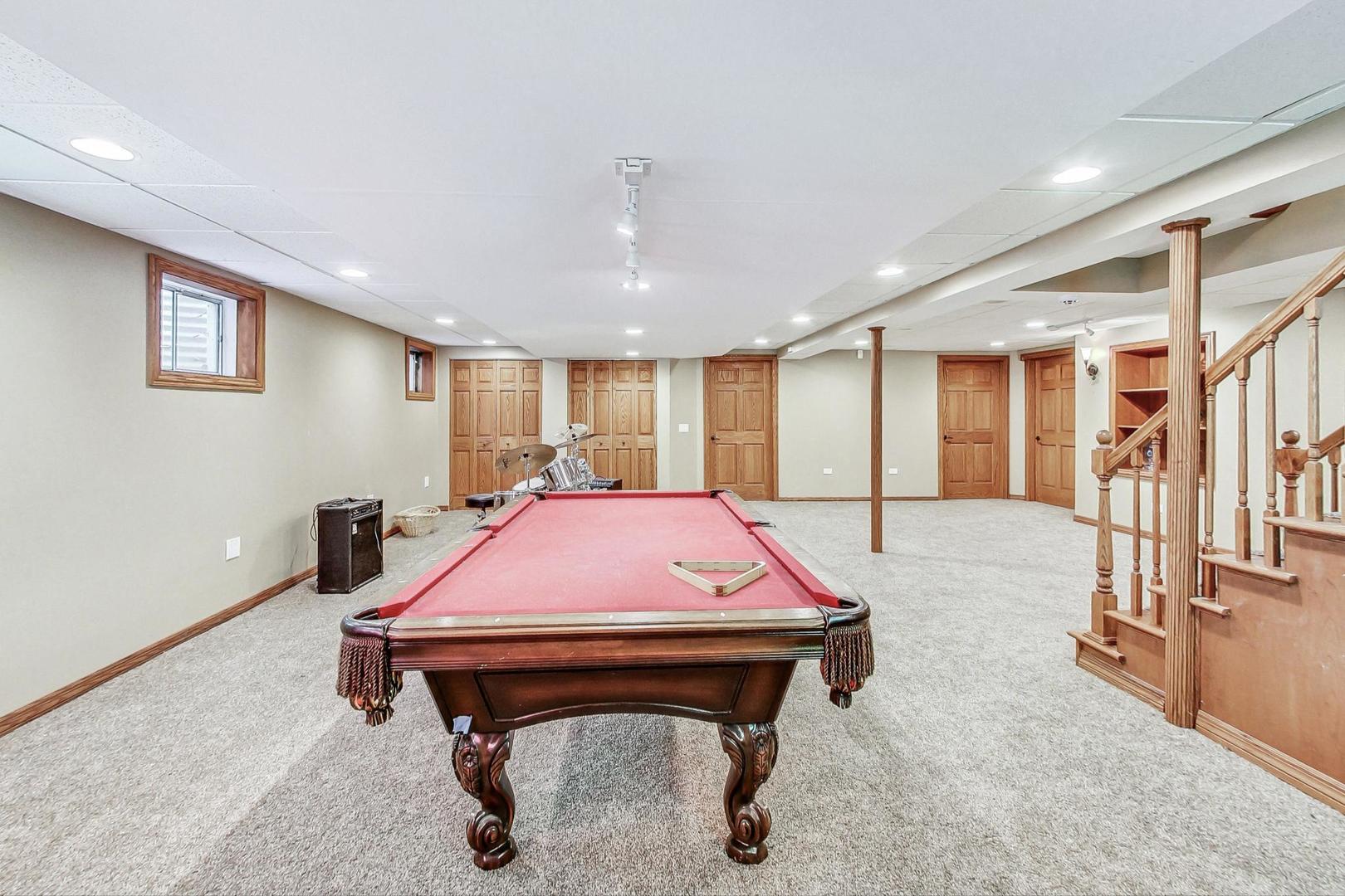 2330 Riverwoods Road Deerfield, IL 60015 - Photo 38 of 50 a room with table tennis table