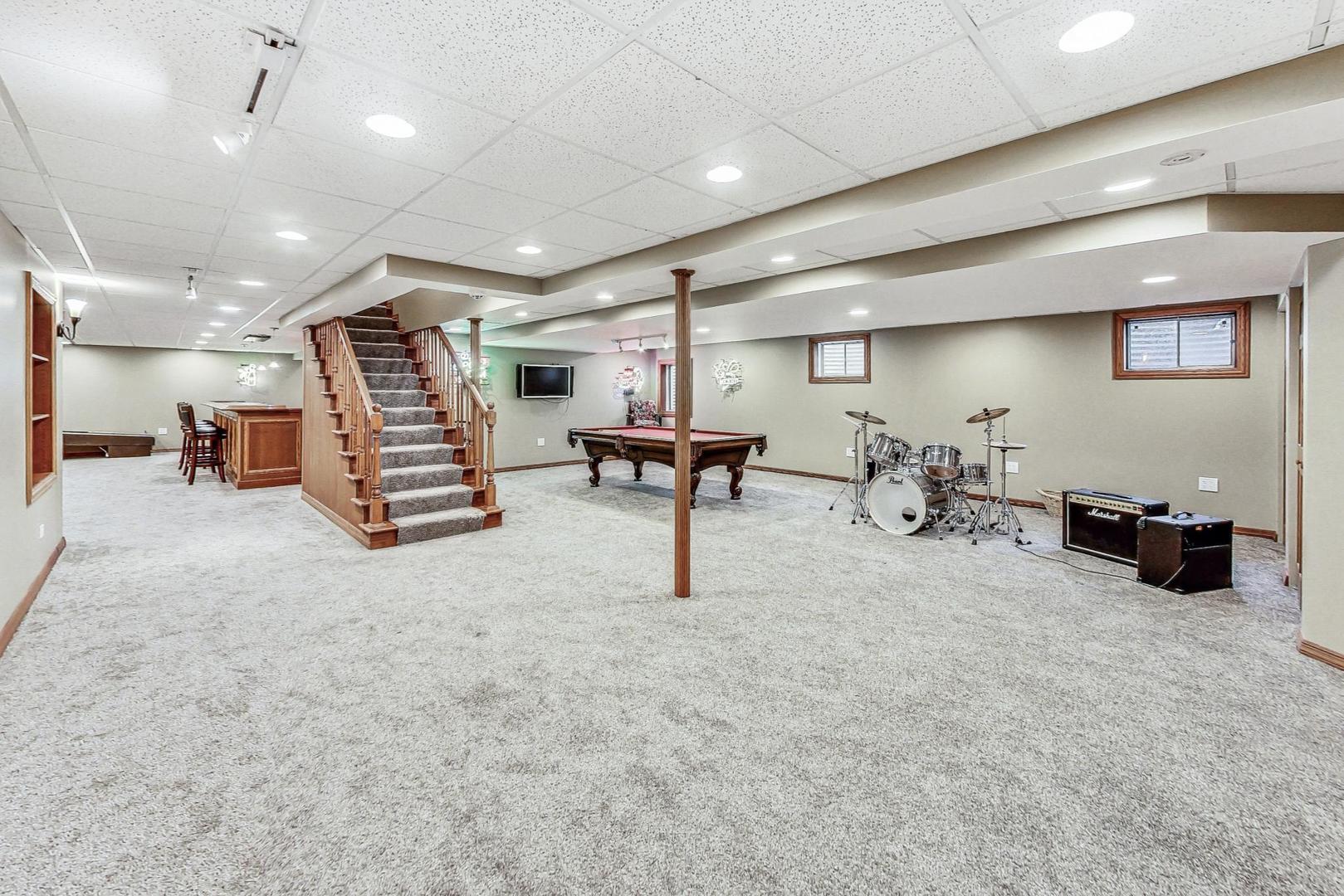2330 Riverwoods Road Deerfield, IL 60015 - Photo 39 of 50 a lobby with furniture and a table