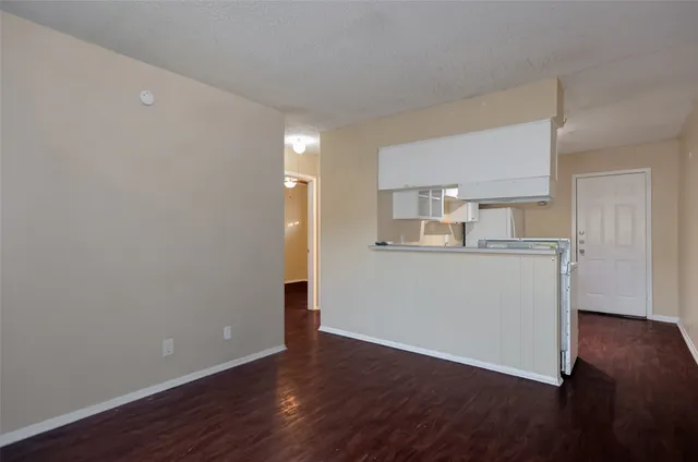 a view of kitchen with wooden floor