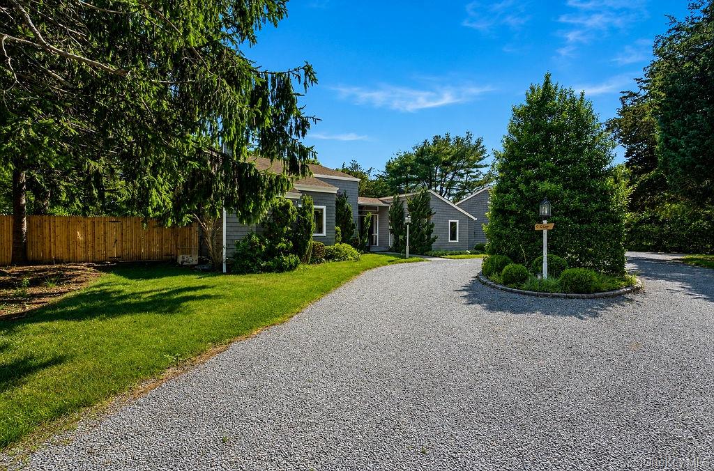 7 Tuthill Lane Remsenburg, NY 11960 - Photo 2 of 43 Welcoming approach via the circular drive