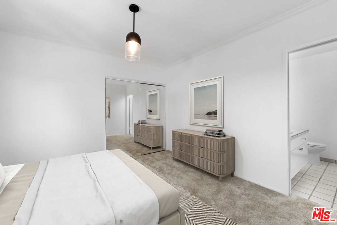 222 7th Street, Unit 301 Santa Monica, CA 90402 - Photo 21 of 55 a spacious bedroom with a bed and a view of bathroom