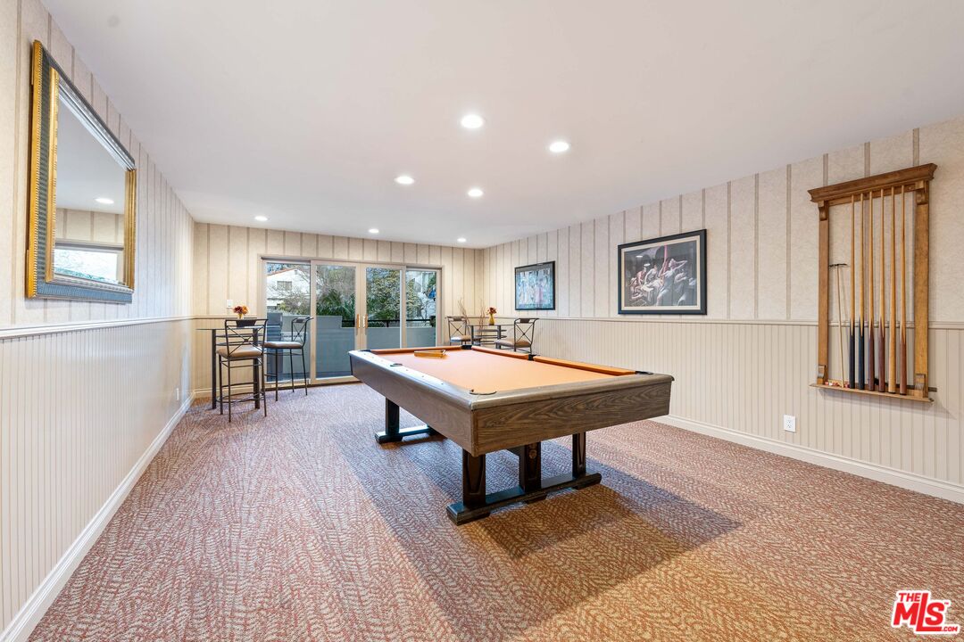 222 7th Street, Unit 301 Santa Monica, CA 90402 - Photo 44 of 55 a room with furniture pool table wooden floor and windows