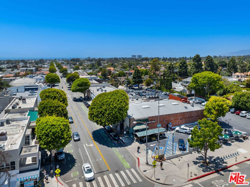 222 7th Street, Unit 301 Santa Monica, CA 90402 - Photo 51 of 55 an aerial view of a building with garden space and outdoor seating