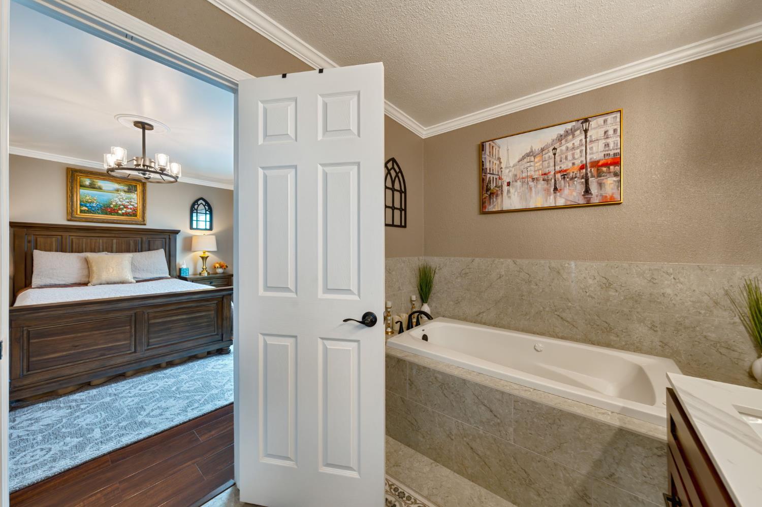 6003 Telesco Way Carmichael, CA 95608 - Photo 24 of 47 a bathroom with a tub a sink and a mirror