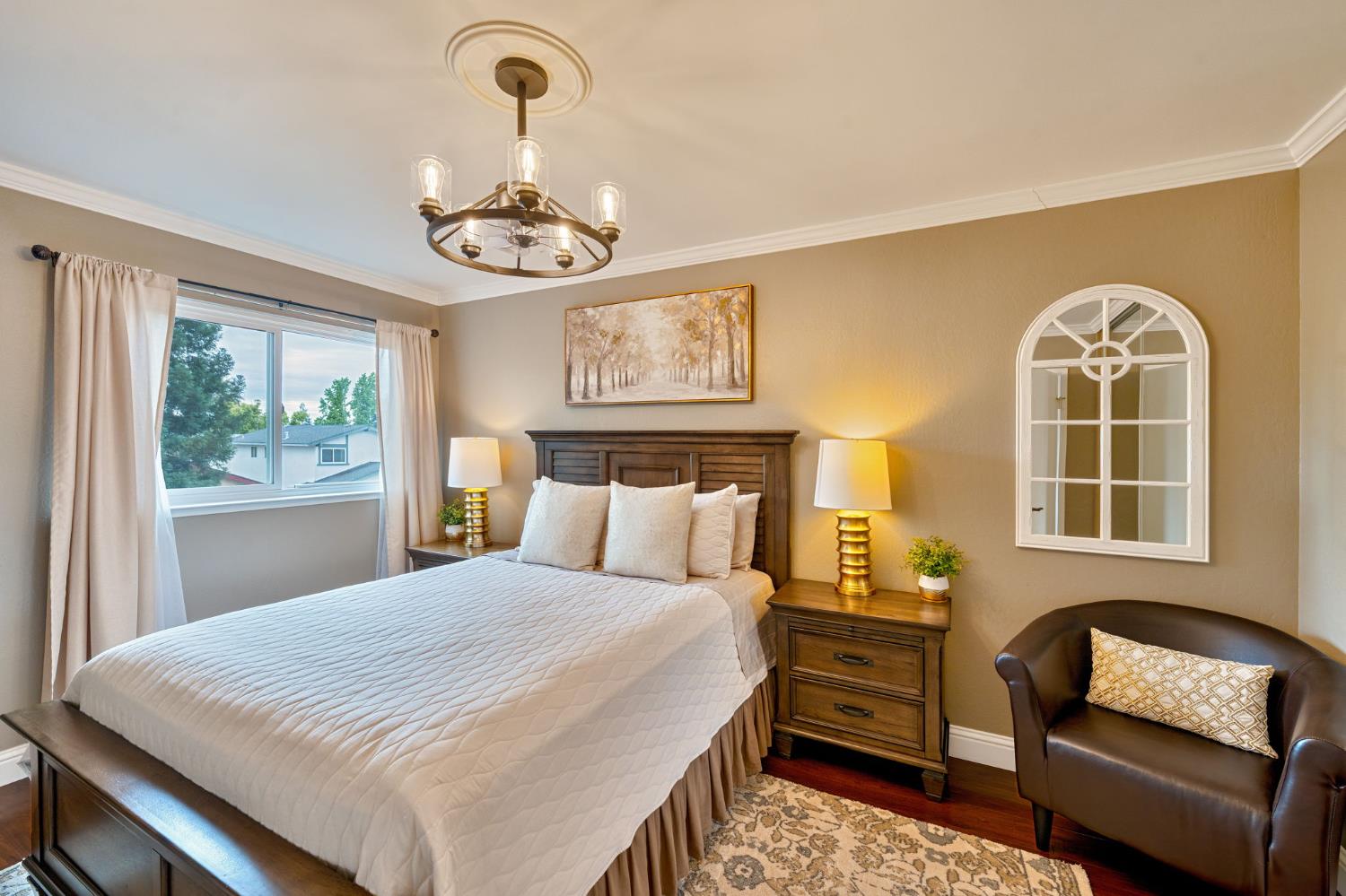 6003 Telesco Way Carmichael, CA 95608 - Photo 25 of 47 a bedroom with a bed chair and a window