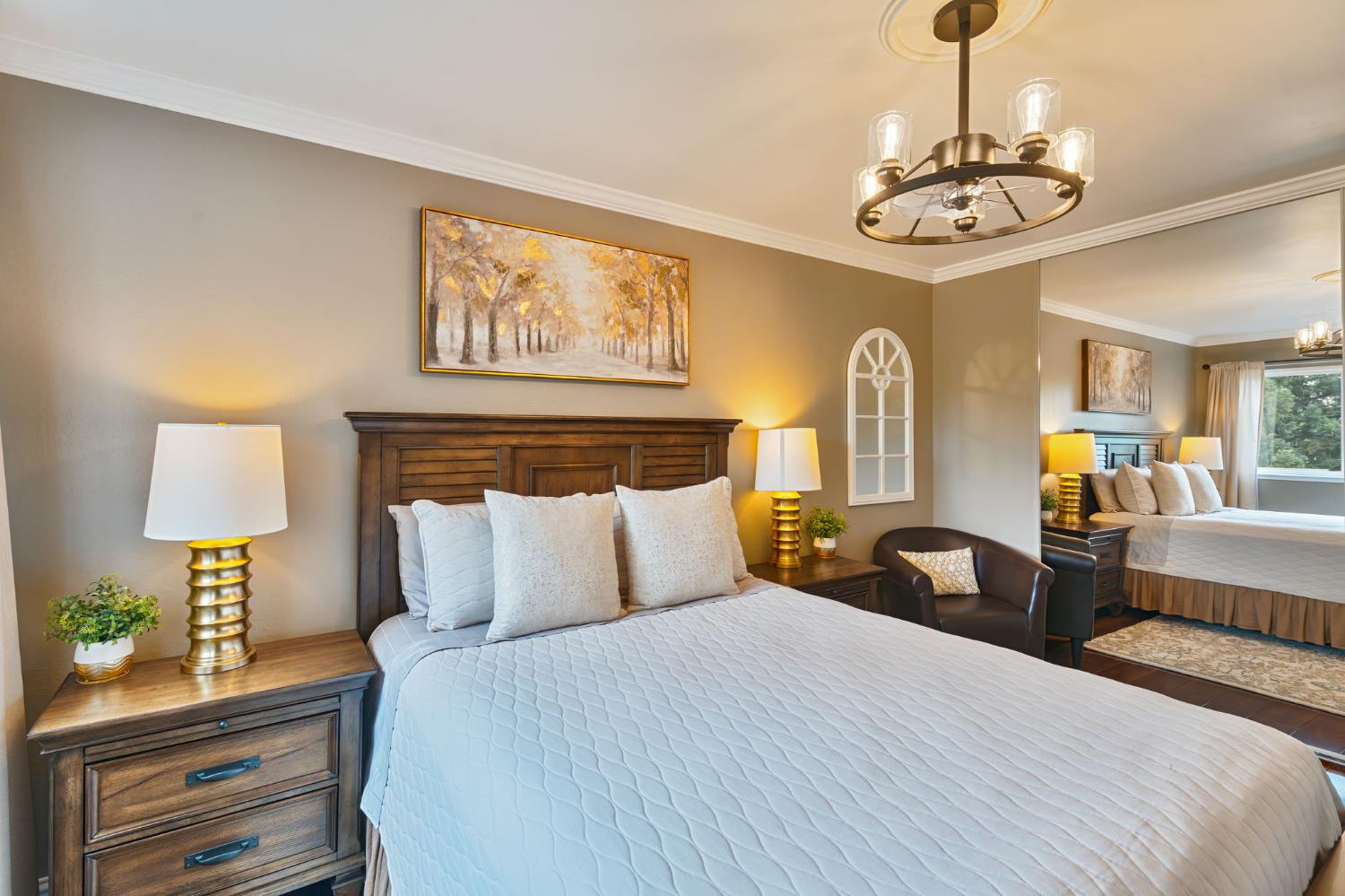 6003 Telesco Way Carmichael, CA 95608 - Photo 26 of 47 a bedroom with bed and a chandelier