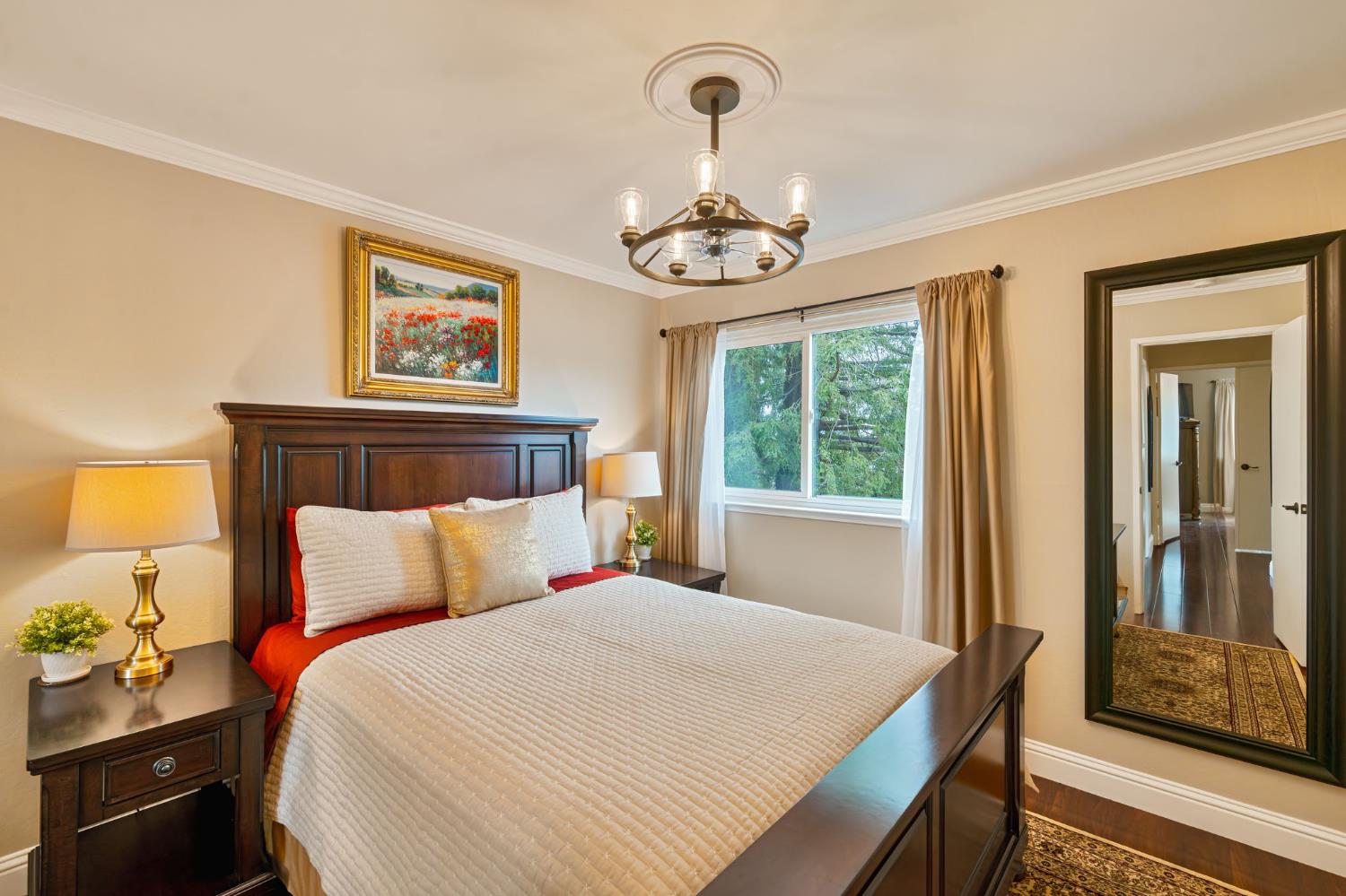 6003 Telesco Way Carmichael, CA 95608 - Photo 27 of 47 a bedroom with a bed and a window