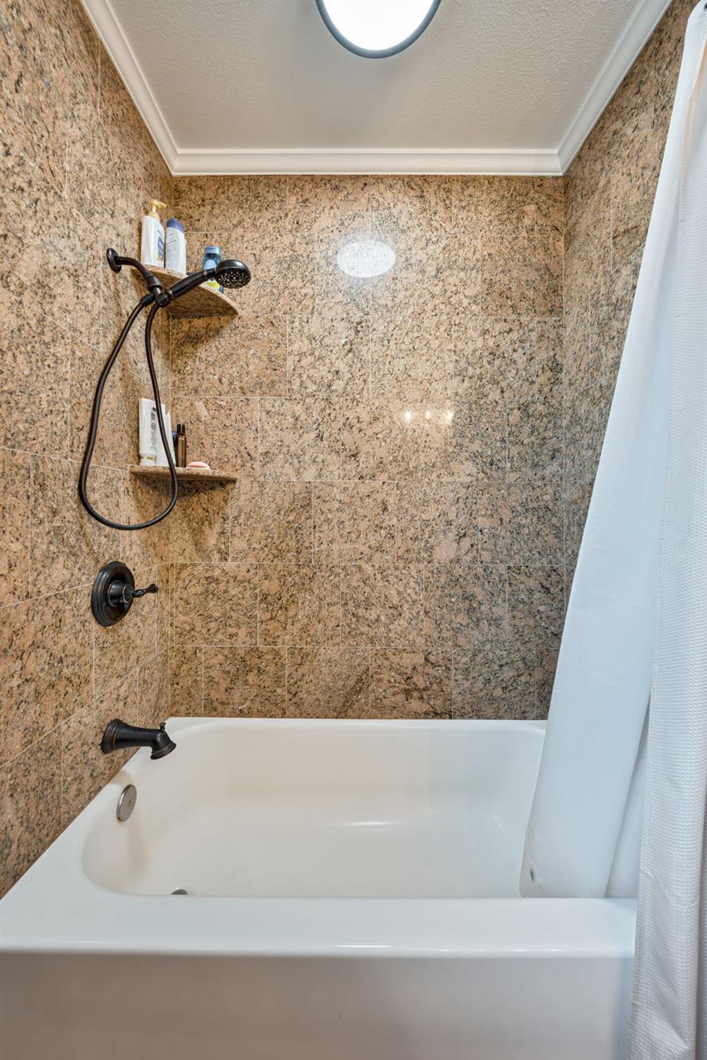 6003 Telesco Way Carmichael, CA 95608 - Photo 30 of 47 a bathroom with a bathtub
