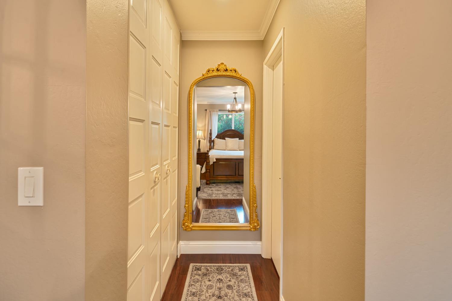 6003 Telesco Way Carmichael, CA 95608 - Photo 35 of 47 a view of a hallway with a wooden floor and a dining room