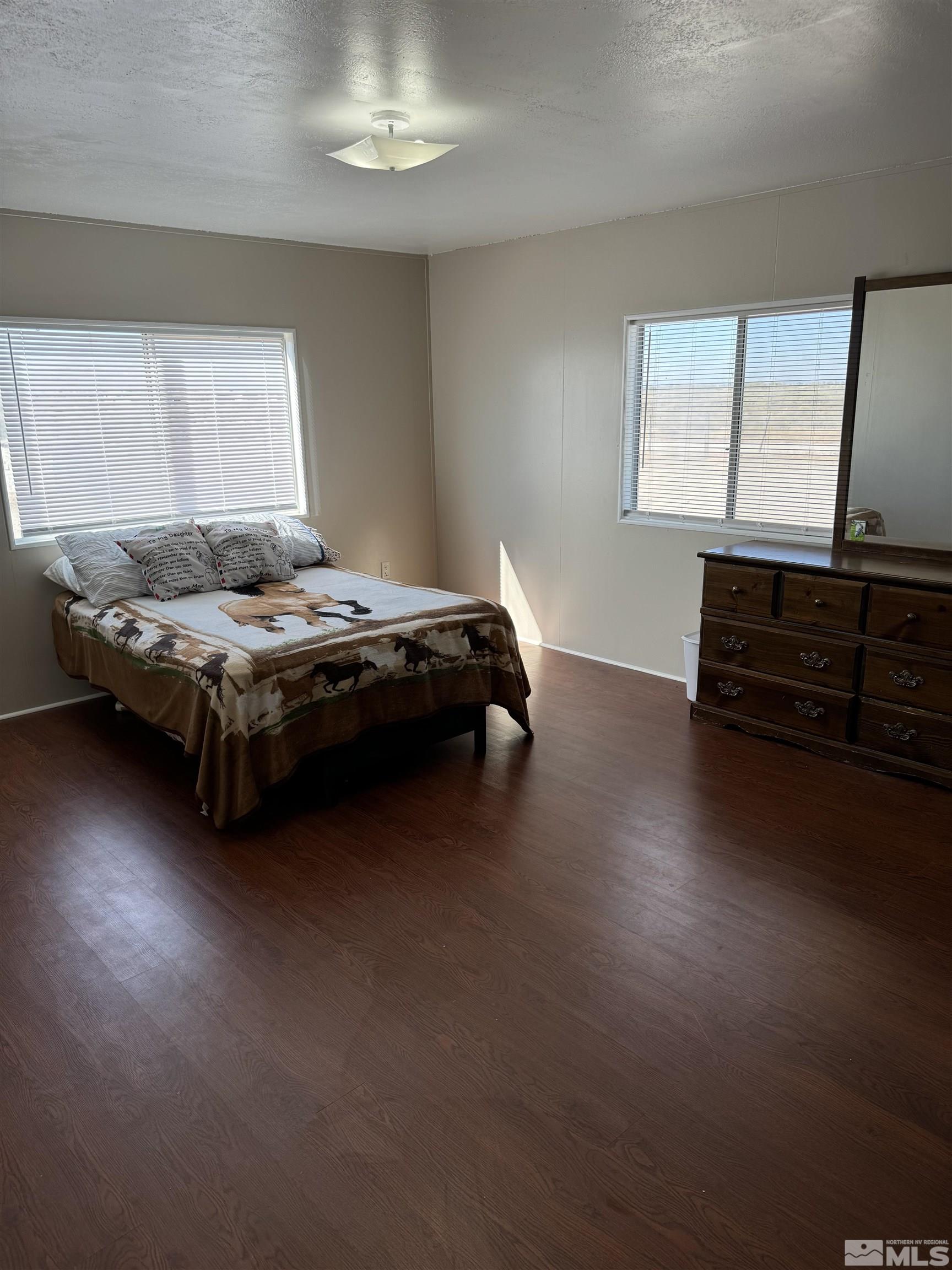 5500 Mission Road Fallon, NV 89406 - Photo 10 of 15 a bedroom with a bed and window