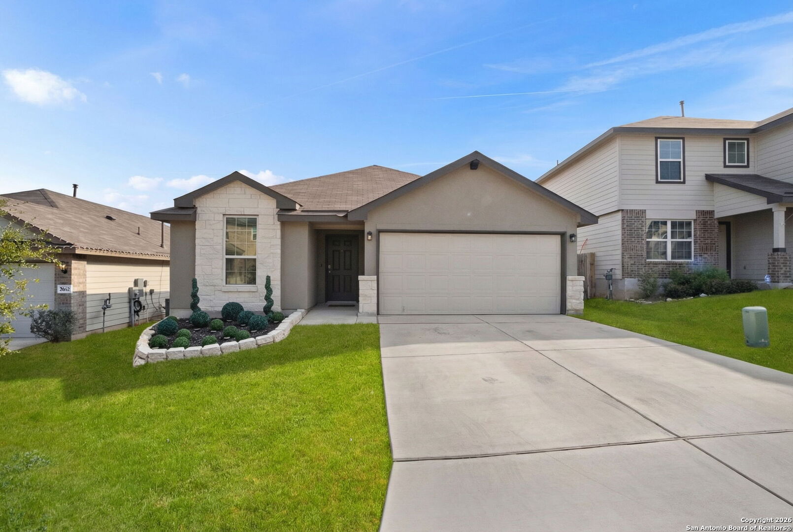 3658 Copper Willow Bulverde, TX 78163 - Photo 3 of 27 a front view of house with yard and green space