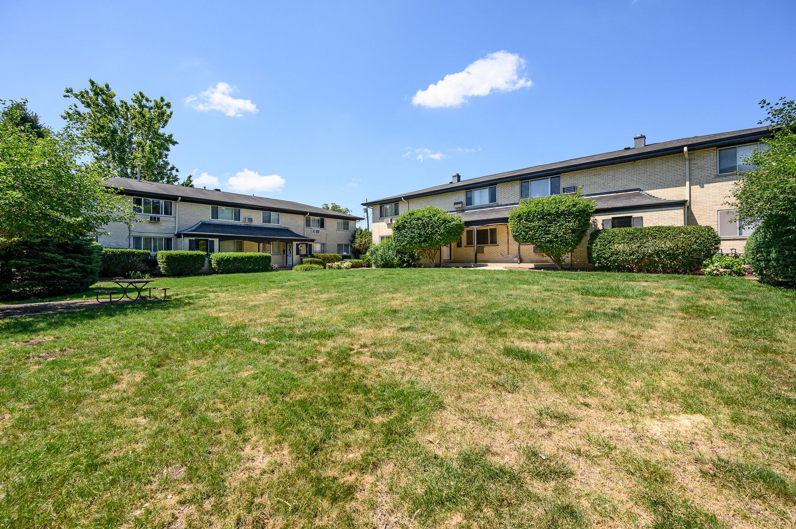 235 East Palatine Road, Unit 1C Palatine, IL 60067 - Photo 13 of 13 a view of a house with a yard