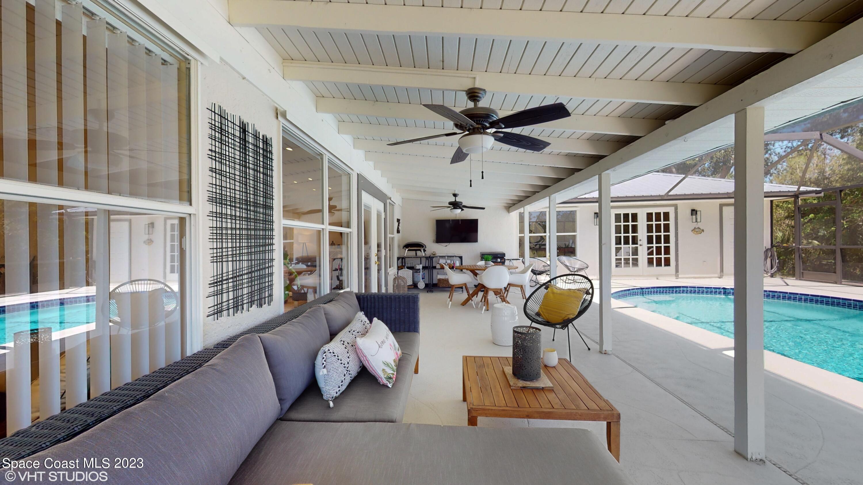 1650 Benjamin Road Malabar, FL 32950 - Photo 29 of 34 a living room with furniture and garden