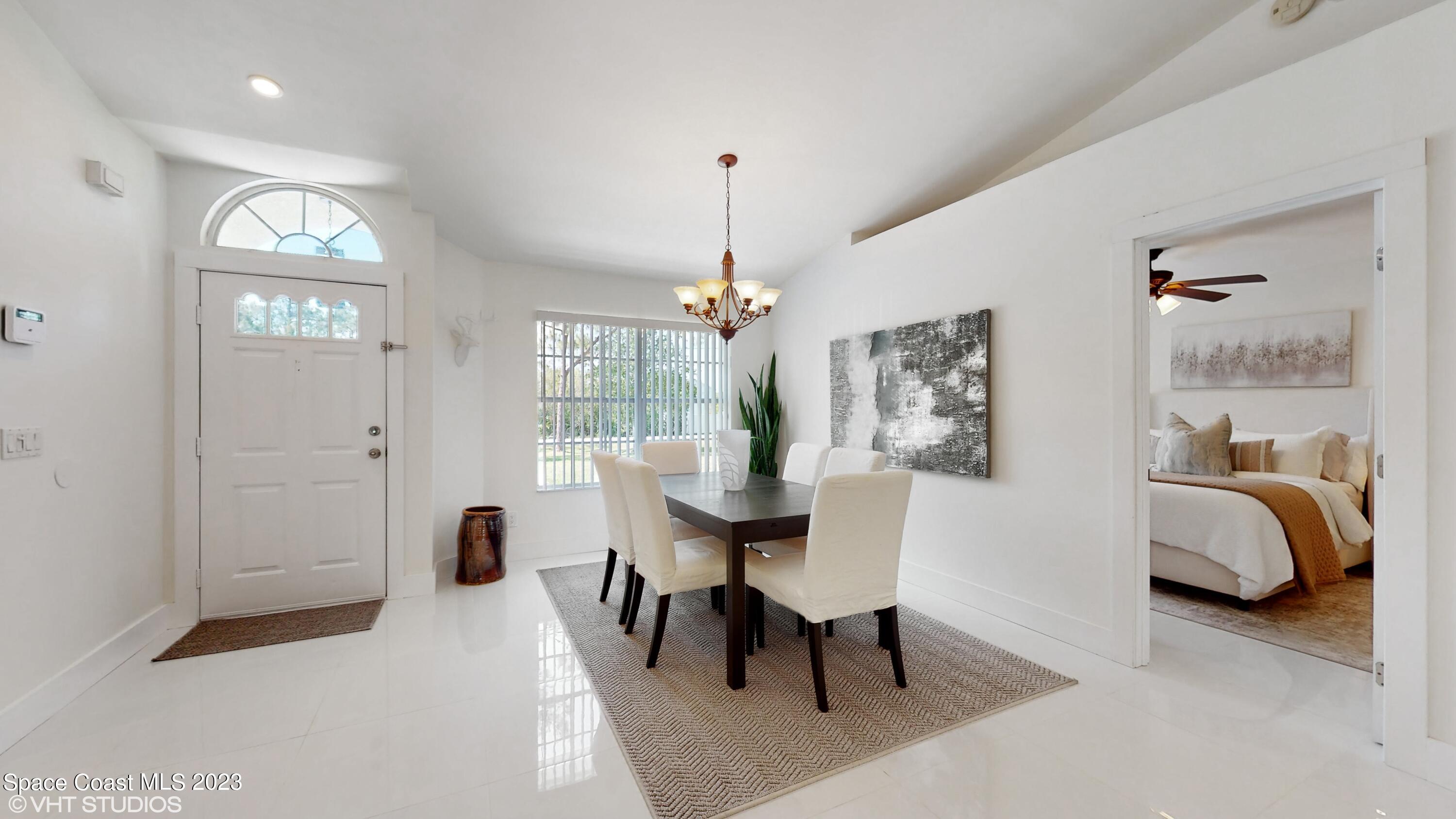 1650 Benjamin Road Malabar, FL 32950 - Photo 9 of 34 a view of a livingroom with furniture and a window