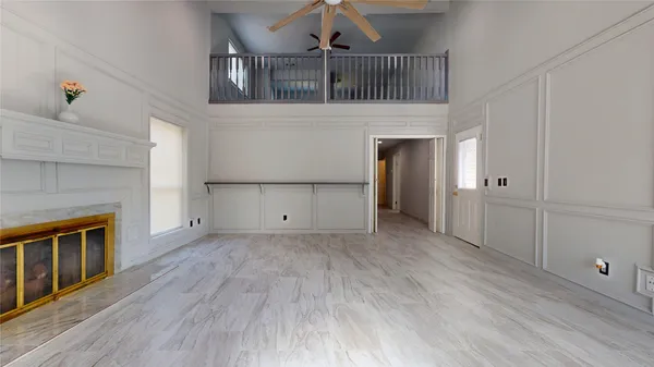 a kitchen with cabinets and white appliances