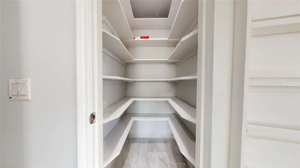 a kitchen with stainless steel appliances granite countertop a sink a stove top oven a counter space and cabinets